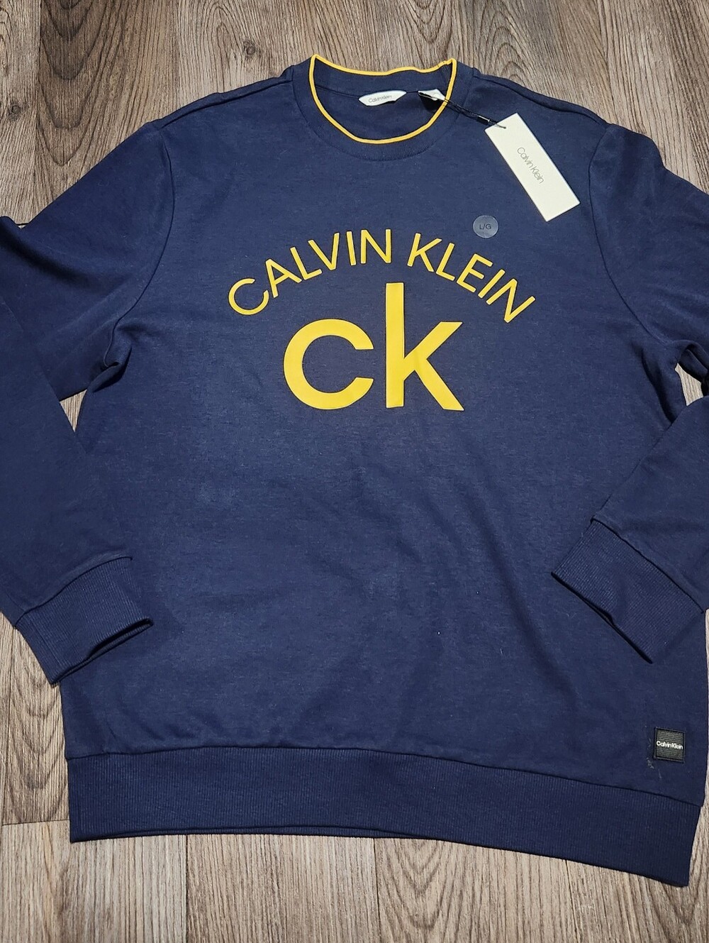 Calvin Klein Navy Crewneck Sweatshirt with Yellow Logo
